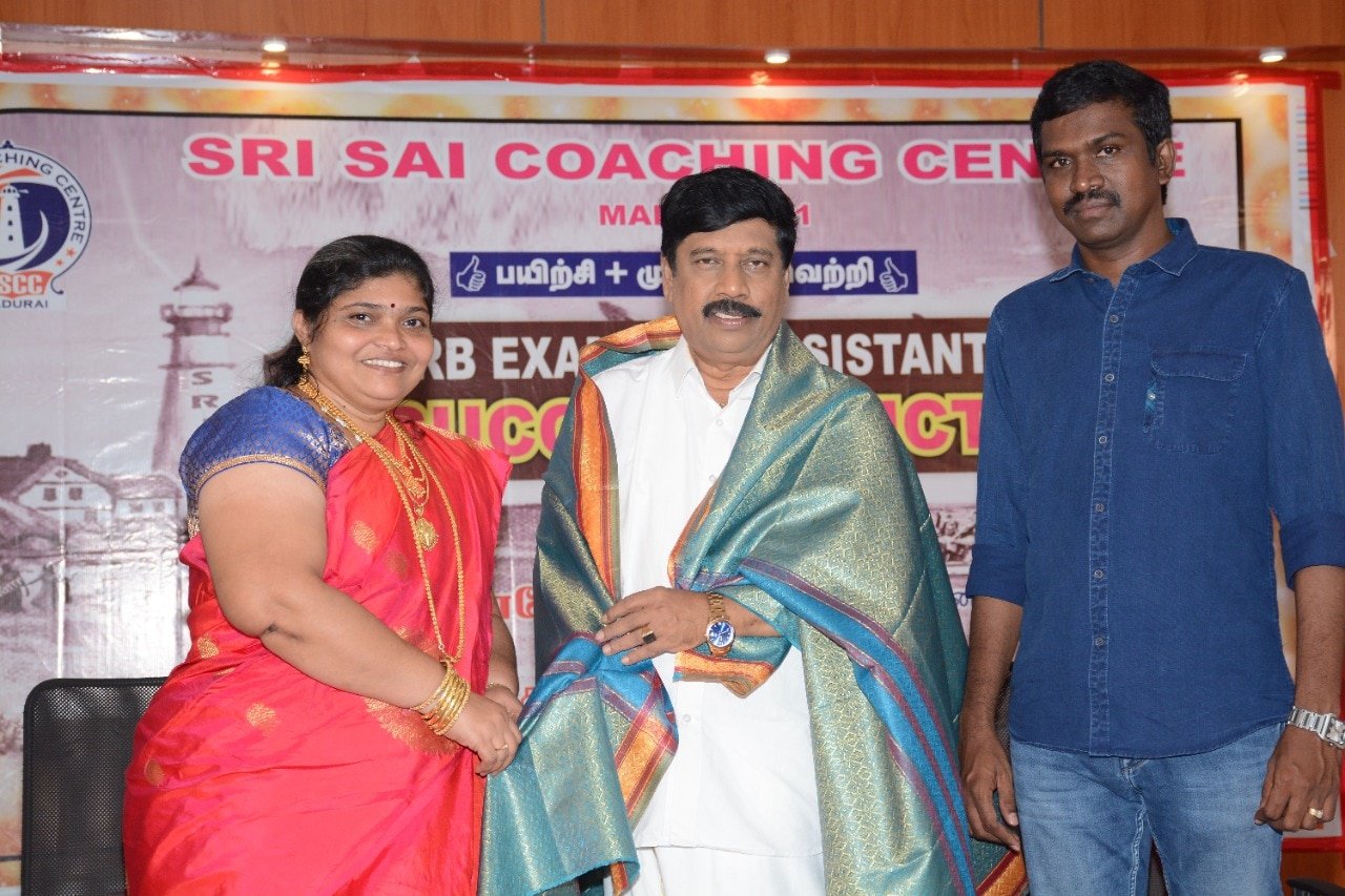 Student being felicitated at the Sri Sai Coaching Centre success function